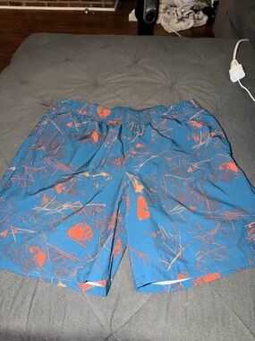 The North Face Teal Swim Shorts with Coral Print